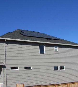 A house featuring a solar panel installed on its roof